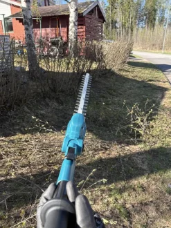 Akkupensasleikkuri Makita DUN461WZ teleskooppivarrella 18V ilman akkua