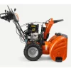 Lumilinko Husqvarna ST 324 sähköstartilla ajovalolla